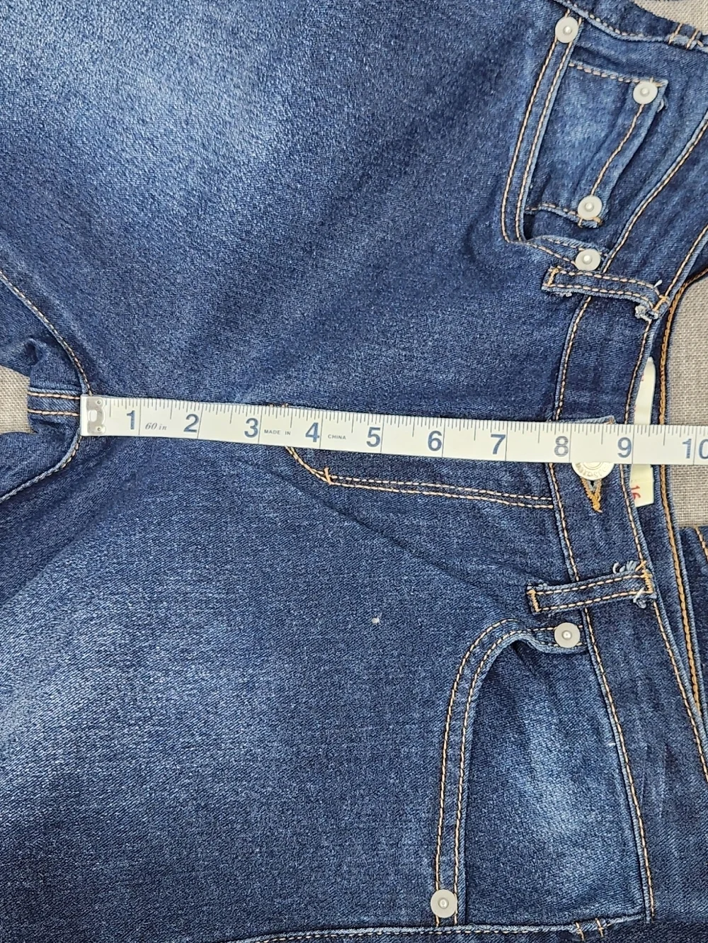 Levis Medium Wash Stretch Boot Cut Denim Jeans. 16.
